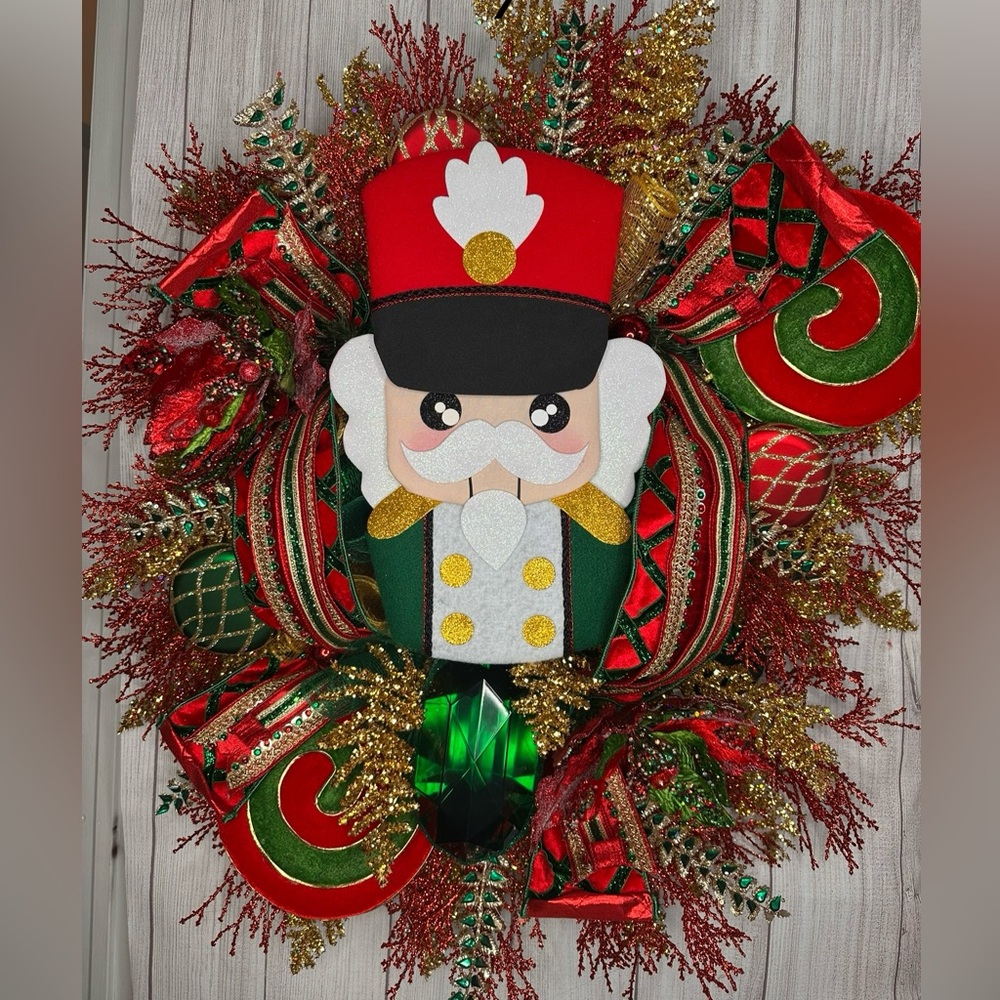 Festive Nutcracker Wreath with Red and Gold Accents